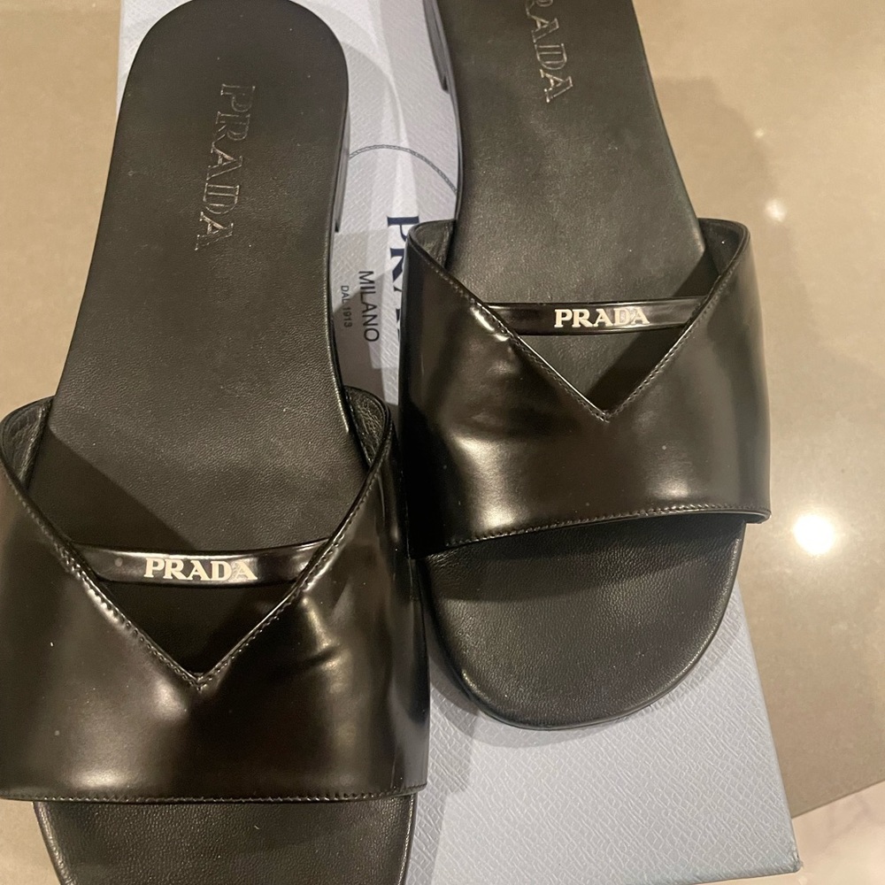 Black Prada sandals, size 40, the top is great condition the bottom is worn out